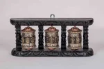Handcrafted Tibetan copper and brass prayer wheels with wooden frame. - Image 2